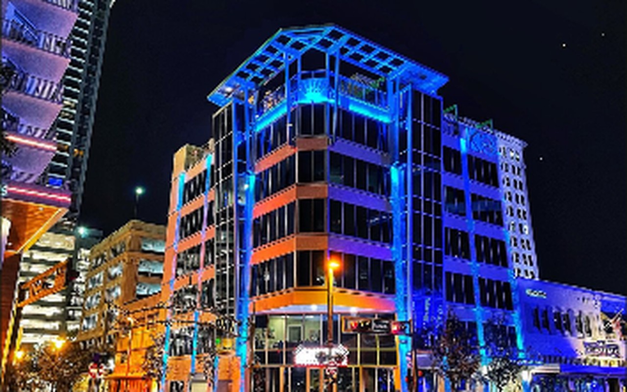Las Olas Boulevard lit in blue neon at night in Fort Lauderdale